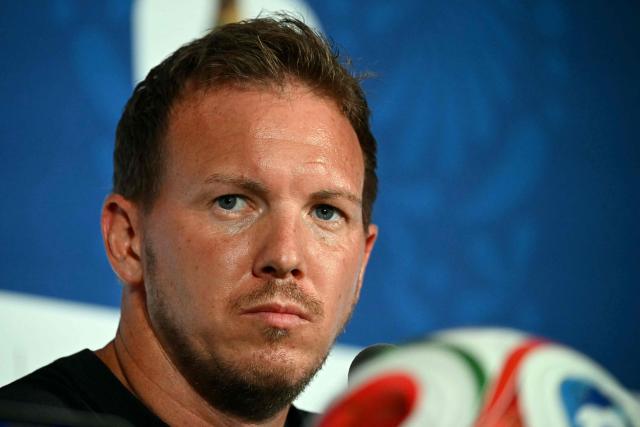 (FILES) Germany's head coach Julian Nagelsmann gives a press conference at the Houston Stadium in Houston on June 13, 2026, on the eve of the 2026 World Cup football match between Germany and Curacao. Germany coach Julian Nagelsmann has resigned following his team's shock last-32 exit from the World Cup at the hands of Paraguay, several media reported on July 3, 2026. (Photo by RONALDO SCHEMIDT / AFP)