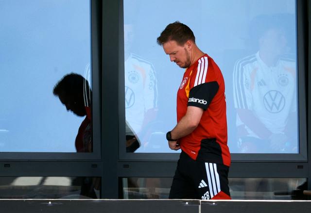 (FILES) Germany's headcoach Julian Nagelsmann oversees a training session in Herzogenaurach, southern Germany on May 30, 2026, on the eve of the international friendly football match Germany against Finland. Germany coach Julian Nagelsmann has resigned following his team's shock last-32 exit from the World Cup at the hands of Paraguay, several media reported on Juli 3, 2026. Nagelsmann, who was under contract until the 2028 European Championship, has accepted the German Football Federation's (DFB) request for him to step down, Bild and Sky Germany reported. (Photo by Karl-Josef HILDENBRAND / AFP)