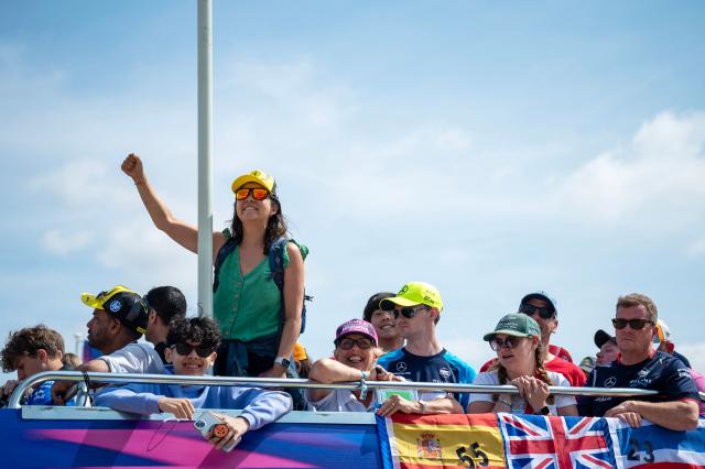 F1 fans wait to see drivers arrive for the first practice session ahead of the Formula One British Grand Prix at the Silverstone motor racing circuit in Silverstone, central England, on July 3, 2026. (Photo by Ben STANSALL / AFP)