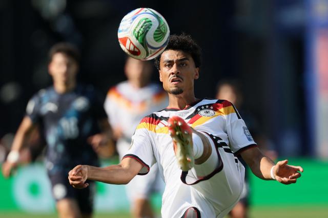 (FILES) Germany's defender #18 Nathaniel Brown kicks the ball during the 2026 World Cup round of 32 football match between Germany and Paraguay at the Boston Stadium in Foxborough on June 29, 2026. FC Bayern have signed Germany international Nathaniel Brown, 23, from Eintracht Frankfurt on a contract until June 30, 2031 the club announced on July 3, 2026. (Photo by Odd ANDERSEN / AFP)
