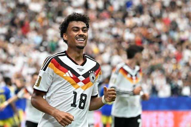 (FILES) Germany's defender #18 Nathaniel Brown celebrates after scoring a goal during the 2026 World Cup Group E football match between Germany and Curacao at the Houston Stadium in Houston on June 14, 2026. FC Bayern have signed Germany international Nathaniel Brown, 23, from Eintracht Frankfurt on a contract until June 30, 2031 the club announced on July 3, 2026. (Photo by Paul ELLIS / AFP)