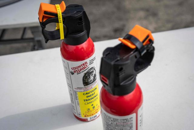 Bear spray prepared for an emergency response drill for bear and other wildlife intrusions is seen in Isehara, Kanagawa prefecture on July 3, 2026. (Photo by Yuichi YAMAZAKI / AFP)