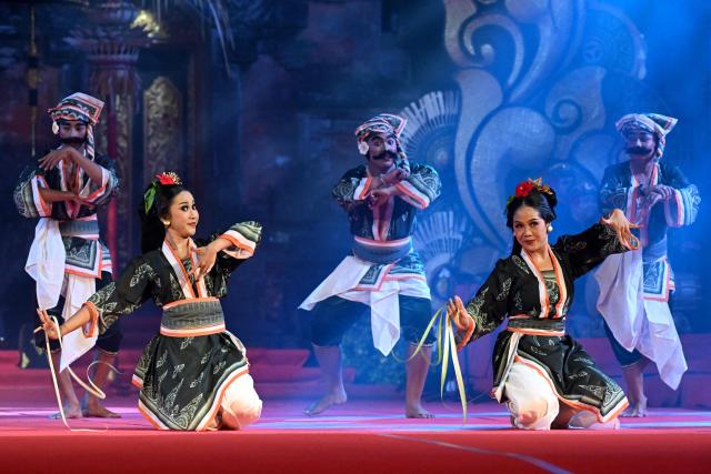 Balinese dancers perform during the Bali Art Festival in Denpasar, Indonesia's resort island of Bali on July 3, 2026. (Photo by SONNY TUMBELAKA / AFP)