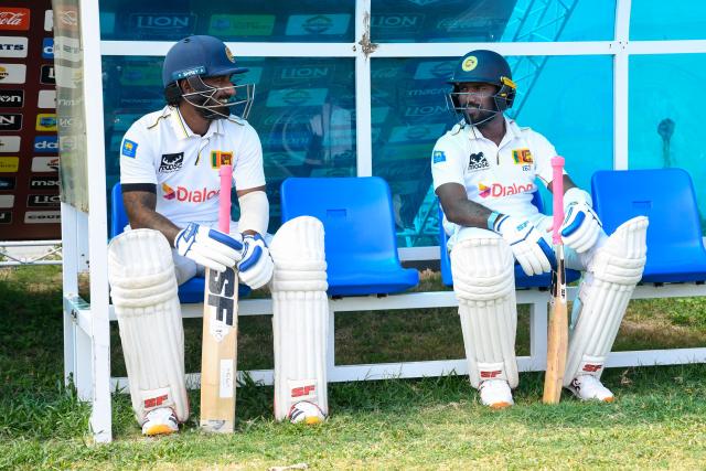 Lahiru Udara (L) and Nishan Madushka (R) of Sri Lanka waiting to open the batting during day one of the second Test cricket match between West Indies and Sri Lanka at Sir Vivian Richards Stadium in North Sound, Antigua and Barbuda, on July 3, 2026. (Photo by Randy Brooks / AFP)