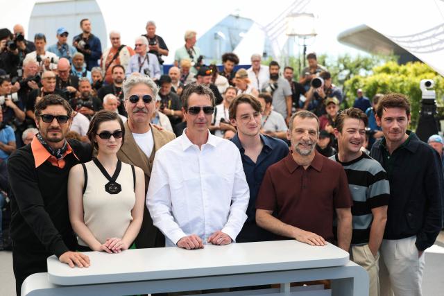 (FILES) (From L) French-Canadian actor Niels Schneider, French actress Anamaria Vartolomei, French-Armenian actor Simon Abkarian, French director and screenwriter Antonin Baudry, French actor Florian Lesieur, French actor Mathieu Kassovitz, French actor Felix Kysyl and French actor Loic Corbery pose during a photocall of the film "La Bataille de Gaulle : L'age de fer" (De Gaulle: Tilting Iron) at the 79th edition of the Cannes Film Festival in Cannes, southern France on May 21, 2026. (Photo by Sameer AL-DOUMY / AFP)