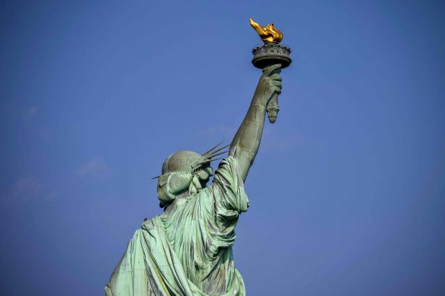 A view of the Statue of Liberty is seen ahead of celebrations for the 250th anniversary of US independence on Liberty Island in New York City, on July 1, 2026. Techno music and lasers brought the Statue of Liberty to life as a light show at the iconic monument will be broadcast on July 3, 2026, to mark the United States' 250th anniversary. The 15-minute spectacle will be shown on the ABC network as an initiative of France, which gifted the monument to the United States in 1886 in celebration of American independence. (Photo by ANGELA WEISS / AFP)