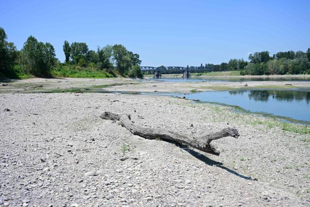 Sandbanks and part of the riverbed are seen along the River Po during drought in Castelvetro Piacentino, near Cremona, Northern Italy on July 3, 2026. Several waterways in northern Italy are in a "critical state" due to drought, and the weather forecast bodes ill for the coming days, the Po River Authority (ADBPO) said on July 3, 2026. (Photo by Piero CRUCIATTI / AFP)