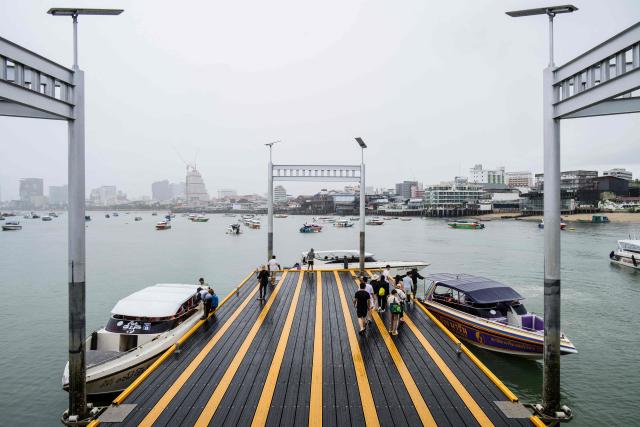 Tourists prepare to board speedboats from Bali Hai Pier in Pattaya on July 3, 2026. (Photo by ANTHONY WALLACE / AFP)