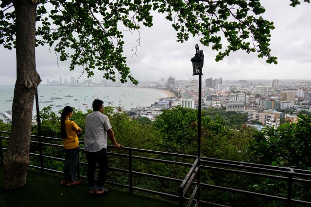 People look at the shoreline from Pratumnak Hill in Pattaya on July 3, 2026. (Photo by ANTHONY WALLACE / AFP)