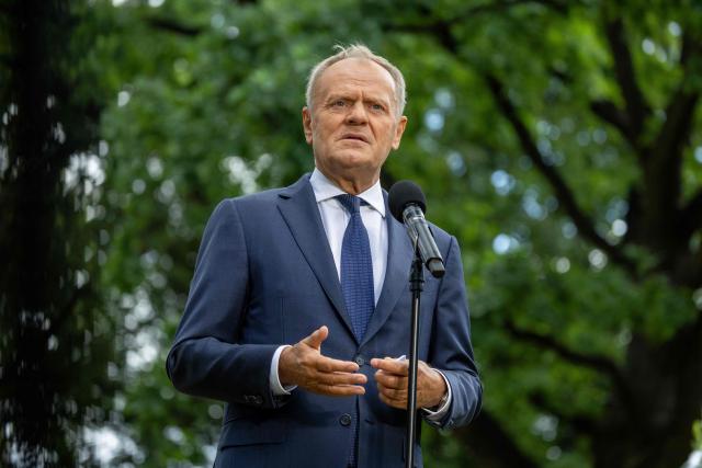 Poland's Prime Minister Donald Tusk speaks to the press during a press conference in the gardens of the Prime Minister's Chancellery building in Warsaw on July 3, 2026. (Photo by Wojtek RADWANSKI / AFP)