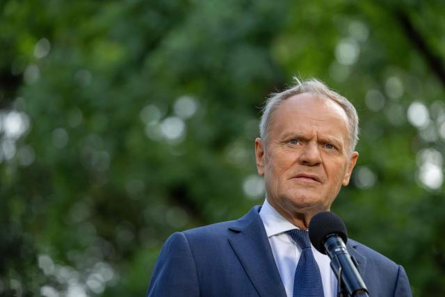 Poland's Prime Minister Donald Tusk speaks to the press during a press conference in the gardens of the Prime Minister's Chancellery building in Warsaw on July 3, 2026. (Photo by Wojtek RADWANSKI / AFP)