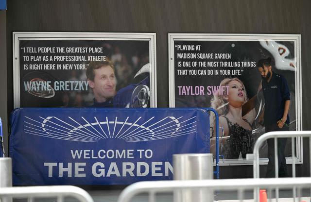 Signs are seen outside Madison Square Garden, the reported venue for the wedding celebrations of pop singer Taylor Swift and pro-athlete Travis Kelce, in New York City on July 3, 2026. Swift and Kelce's official wedding plans are tightly under wraps, but New York is bracing to host the celebrity marriage of the year this week at Madison Square Garden. The wedding will reportedly take place Friday with a star-studded guest list of around 1,000, including models Gigi Hadid and Cara Delevingne, singer Selena Gomez, and actress Zoe Kravitz -- all known to be close Swift pals -- and Kelce's Kansas City Chiefs teammates. (Photo by ANGELA WEISS / AFP)
