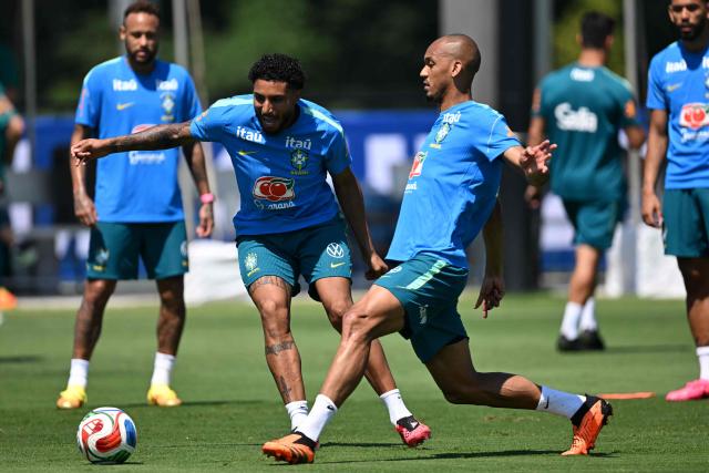 Brazil's defender #02 Ederson Silva (C,L) and Brazil's midfielder #17 Fabinho (C,R) practice during a training session at the Columbia Park Training Facility in Morristown, New Jersey on July 3, 2026, ahead of the 2026 World Cup tournament round of 16 football match between Brazil and Norway.  (Photo by MAURO PIMENTEL / AFP)