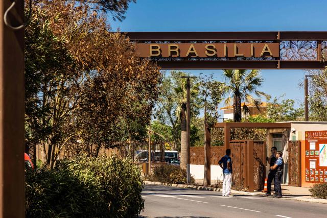 This photograph shows the entrance of the camping 'Le Brasilia', a day after a fire broke out, in Canet-en-Roussillon, southern France on July 3, 2026. Nearly 3,000 people had to be evacuated from several campsites, as well as from businesses and several municipalities, after a fire broke out in Sainte-Marie-la-Mer and spread on to Canet-en-Roussillon, affecting the watersports hub, firefighters and the prefect of Pyrenees-Orientales said on July 2, 2026. (Photo by Jean-Christophe MILHET / AFP)