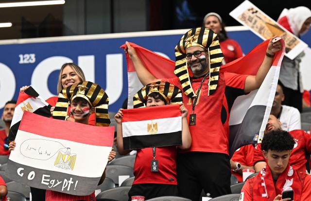 Egypt supporters pose in the tribunes prior to the 2026 World Cup round of 32 football match between Australia and Egypt at the Dallas Stadium in Arlington on July 3, 2026.  (Photo by Paul ELLIS / AFP)