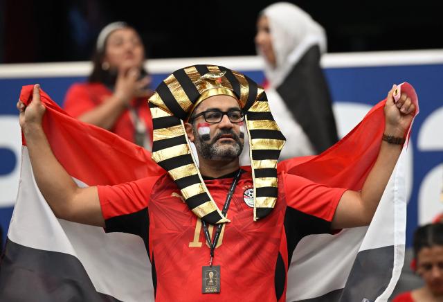 An Egypt supporter holds a national flag prior to the 2026 World Cup round of 32 football match between Australia and Egypt at the Dallas Stadium in Arlington on July 3, 2026.  (Photo by Paul ELLIS / AFP)