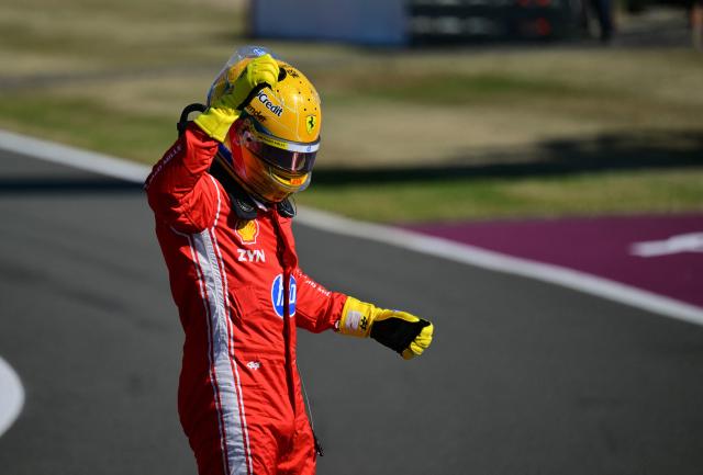 Ferrari's British driver Lewis Hamilton celebrates his pole position after the sprint qualifying session ahead of the Formula One British Grand Prix at the Silverstone motor racing circuit in Silverstone, central England, on July 3, 2026. (Photo by Andrej ISAKOVIC / AFP)