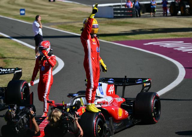 Ferrari's British driver Lewis Hamilton celebrates his pole position after the sprint qualifying session ahead of the Formula One British Grand Prix at the Silverstone motor racing circuit in Silverstone, central England, on July 3, 2026. (Photo by Andrej ISAKOVIC / AFP)