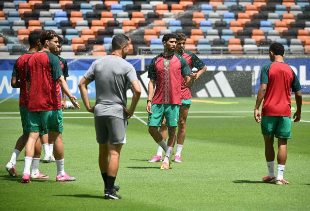 Morocco's defender #02 Achraf Hakimi (C) reacts with teammates as they take part in an MD-1 training session at the Houston Sports Park in Houston on July 3, 2026, on the eve of the 2026 World Cup round of 16 football match between Canada and Morocco. (Photo by RONALDO SCHEMIDT / AFP)