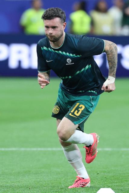 Australia's midfielder #13 Aiden O'Neill warms up prior to the  2026 World Cup round of 32 football match between Australia and Egypt at the Dallas Stadium in Arlington on July 3, 2026.  (Photo by Thomas COEX / AFP)