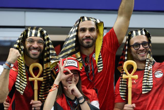 Egypt supporters wearing Pharaoh costumes pose in the tribunes prior to the 2026 World Cup round of 32 football match between Australia and Egypt at the Dallas Stadium in Arlington on July 3, 2026.  (Photo by Thomas COEX / AFP)