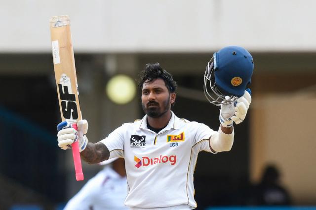 Lahiru Udara of Sri Lanka celebrates his century during the 1st day of the 2nd Test between Sri Lanka and West Indies at Vivian Richards Cricket Stadium in North Sound, Antigua and Barbuda, on July 3, 2026. (Photo by Randy Brooks / AFP)