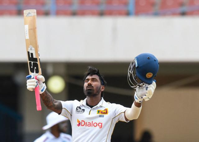 Lahiru Udara of Sri Lanka celebrates his century during the 1st day of the 2nd Test between Sri Lanka and West Indies at Vivian Richards Cricket Stadium in North Sound, Antigua and Barbuda, on July 3, 2026. (Photo by Randy Brooks / AFP)