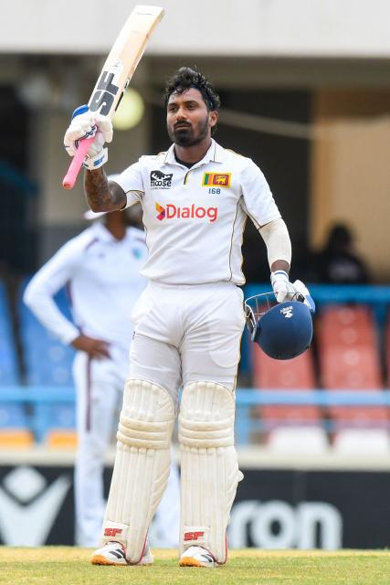 Lahiru Udara of Sri Lanka celebrates his century during the 1st day of the 2nd Test between Sri Lanka and West Indies at Vivian Richards Cricket Stadium in North Sound, Antigua and Barbuda, on July 3, 2026. (Photo by Randy Brooks / AFP)