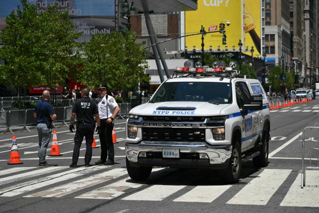 7th Avenue is blocked off by New York City Police (NYPD) officers near Madison Square Garden, the reported venue for the wedding celebrations of pop singer Taylor Swift and pro-athlete Travis Kelce, in New York City on July 3, 2026. Swift and Kelce's official wedding plans are tightly under wraps, but New York is bracing to host the celebrity marriage of the year this week at Madison Square Garden. The wedding will reportedly take place Friday with a star-studded guest list of around 1,000, including models Gigi Hadid and Cara Delevingne, singer Selena Gomez, and actress Zoe Kravitz -- all known to be close Swift pals -- and Kelce's Kansas City Chiefs teammates. (Photo by ANGELA WEISS / AFP)