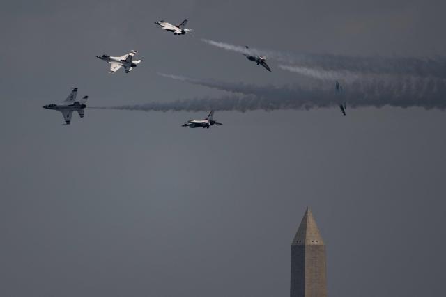 A US Air Force Thunderbirds demonstration squadron flies over the National Mall near the Washington Monument in Washington, DC, on July 3, 2026, ahead of the upcoming July 4 holiday. (Photo by Kent Nishimura / AFP)