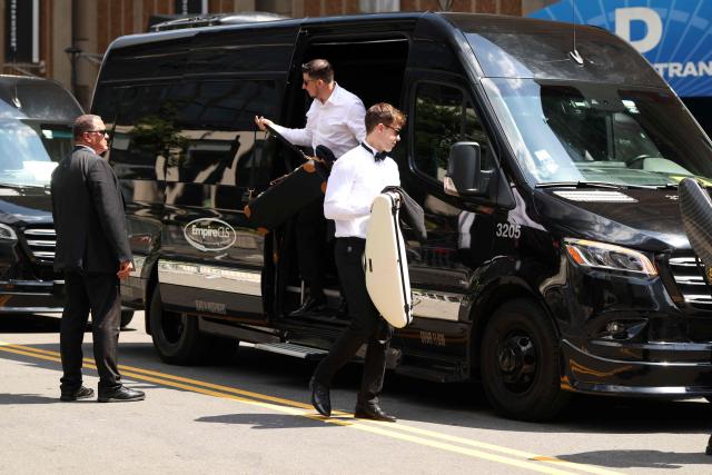 Musicians arrive at Madison Square Garden, the reported venue for the wedding celebrations of pop singer Taylor Swift and pro-athlete Travis Kelce, in New York City on July 3, 2026. Swift and Kelce's official wedding plans are tightly under wraps, but New York is bracing to host the celebrity marriage of the year this week at Madison Square Garden. The wedding will reportedly take place Friday with a star-studded guest list of around 1,000, including models Gigi Hadid and Cara Delevingne, singer Selena Gomez, and actress Zoe Kravitz -- all known to be close Swift pals -- and Kelce's Kansas City Chiefs teammates. (Photo by CHARLY TRIBALLEAU / AFP)