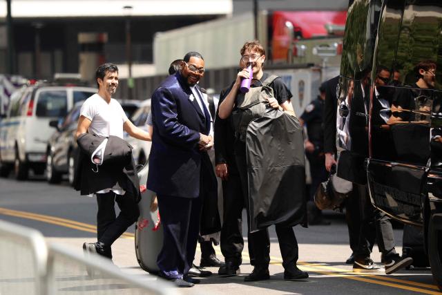 Musicians arrive at Madison Square Garden, the reported venue for the wedding celebrations of pop singer Taylor Swift and pro-athlete Travis Kelce, in New York City on July 3, 2026. Swift and Kelce's official wedding plans are tightly under wraps, but New York is bracing to host the celebrity marriage of the year this week at Madison Square Garden. The wedding will reportedly take place Friday with a star-studded guest list of around 1,000, including models Gigi Hadid and Cara Delevingne, singer Selena Gomez, and actress Zoe Kravitz -- all known to be close Swift pals -- and Kelce's Kansas City Chiefs teammates. (Photo by CHARLY TRIBALLEAU / AFP)