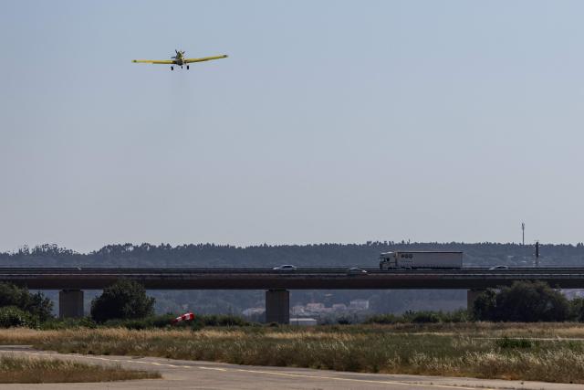 A Fire Boss firefighting aircraft takes off from the Santarem Municipal Aerodrome - Cosme Pedrogao in Santarem, Portugal, on July 3, 2026. Parts of Portugal are under red alert due to forecast high temperatures in the coming days after being relatively spared by the recent European heatwave, with the IPMA weather agency placing regions including Leiria and Coimbra on alert through Friday as temperatures could reach 44°C in some areas. (Photo by HENRIQUE CASINHAS / AFP)