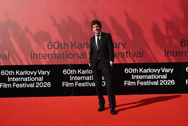 US actor Jesse Eisenberg poses on the red carpet as he arrives for the opening of the 60th Karlovy Vary International Film Festival (KVIFF) in Karlovy Vary, Czech Republic on July 3, 2026. (Photo by Michal Cizek / AFP)