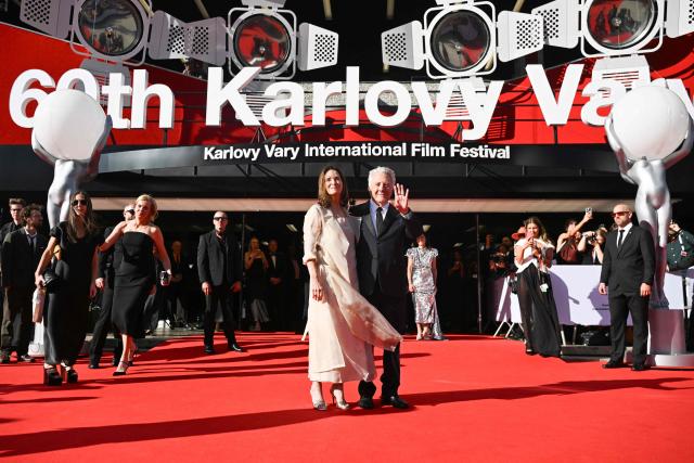 US actor Dustin Hoffman and his wife Lisa pose on the red carpet as they arrive for the opening of the 60th Karlovy Vary International Film Festival (KVIFF) in Karlovy Vary, Czech Republic on July 3, 2026. (Photo by Michal Cizek / AFP)