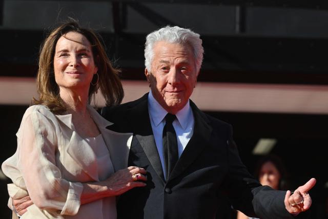 US actor Dustin Hoffman and his wife Lisa pose on the red carpet as they arrive for the opening of the 60th Karlovy Vary International Film Festival (KVIFF) in Karlovy Vary, Czech Republic on July 3, 2026. (Photo by Michal Cizek / AFP)