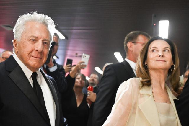 US actor Dustin Hoffman and his wife Lisa arrive for the opening of the 60th Karlovy Vary International Film Festival (KVIFF) in Karlovy Vary, Czech Republic on July 3, 2026. (Photo by Michal Cizek / AFP)