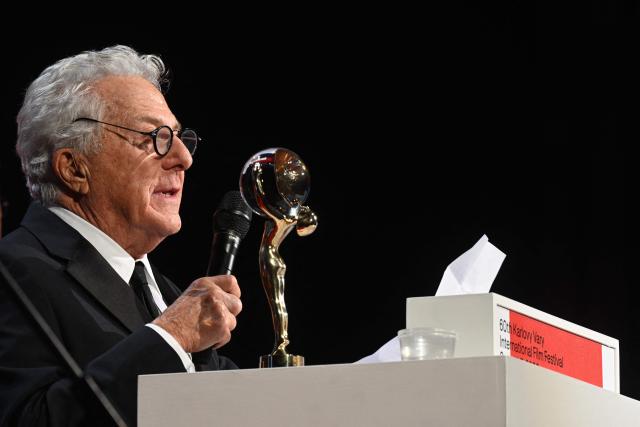 US actor Dustin Hoffman gives a speech after receiving the Festival President's Award Crystal Globe during the opening of the 60th Karlovy Vary International Film Festival (KVIFF) in Karlovy Vary, Czech Republic on July 3, 2026. (Photo by Michal Cizek / AFP)