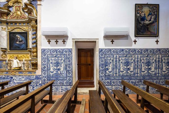 The Parish Church of Sao Domingos de Gusmao - Vale de Figueira is seen equipped with air conditioning in Santarem, Portugal, on July 3, 2026. Parts of Portugal are under red alert due to forecast high temperatures in the coming days after being relatively spared by the recent European heatwave, with the IPMA weather agency placing regions including Leiria and Coimbra on alert through Friday as temperatures could reach 44°C in some areas. (Photo by HENRIQUE CASINHAS / AFP)