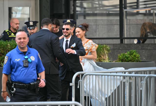 People arrive at Madison Square Garden, the reported venue for the wedding celebrations of pop singer Taylor Swift and pro-athlete Travis Kelce, in New York City on July 3, 2026. Swift and Kelce's official wedding plans are tightly under wraps, but New York is bracing to host the celebrity marriage of the year this week at Madison Square Garden. The wedding will reportedly take place Friday with a star-studded guest list of around 1,000, including models Gigi Hadid and Cara Delevingne, singer Selena Gomez, and actress Zoe Kravitz -- all known to be close Swift pals -- and Kelce's Kansas City Chiefs teammates. (Photo by ANGELA WEISS / AFP)