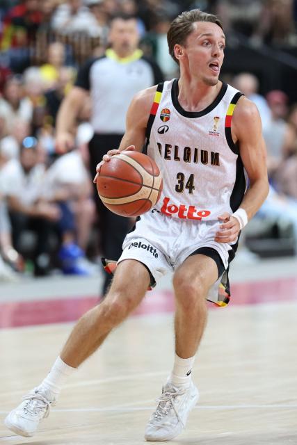 Belgium's Niels Van den Eynde runs with the ball during a qualifier basketball match between Belgium and France for the men's 2027 FIBA World Championships in Antwerp, on July 3, 2026. (Photo by VIRGINIE LEFOUR / Belga / AFP) / Belgium OUT