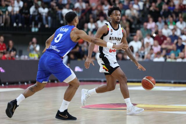 Belgium's forward #22 Zaccharie Mortant (R) dribbles with the ball during a qualifier basketball match between Belgium and France for the men's 2027 FIBA World Championships in Antwerp, on July 3, 2026. (Photo by VIRGINIE LEFOUR / Belga / AFP) / Belgium OUT