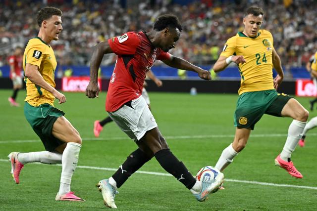 Egypt's forward #12 Haissem Hassan kicks the ball during the 2026 World Cup round of 32 football match between Australia and Egypt at the Dallas Stadium in Arlington on July 3, 2026.  (Photo by Paul ELLIS / AFP)