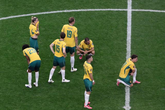 Australia's players react after losing the 2026 World Cup round of 32 football match between Australia and Egypt at the Dallas Stadium in Arlington on July 3, 2026.  (Photo by Aric Becker / AFP)