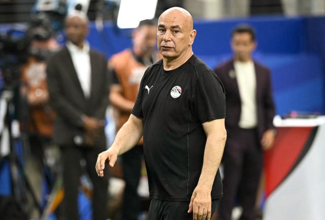 Egypt's head coach Hossam Hassan celebrates after winning the 2026 World Cup round of 32 football match between Australia and Egypt at the Dallas Stadium in Arlington on July 3, 2026.  (Photo by Paul ELLIS / AFP)