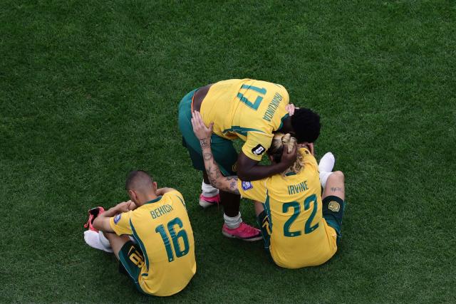 Australia's players react after losing the 2026 World Cup round of 32 football match between Australia and Egypt at the Dallas Stadium in Arlington on July 3, 2026.  (Photo by Aric Becker / AFP)