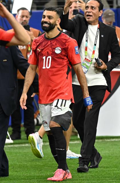 Egypt's forward #10 Mohamed Salah celebrates after winning the 2026 World Cup round of 32 football match between Australia and Egypt at the Dallas Stadium in Arlington on July 3, 2026.  (Photo by Paul ELLIS / AFP)