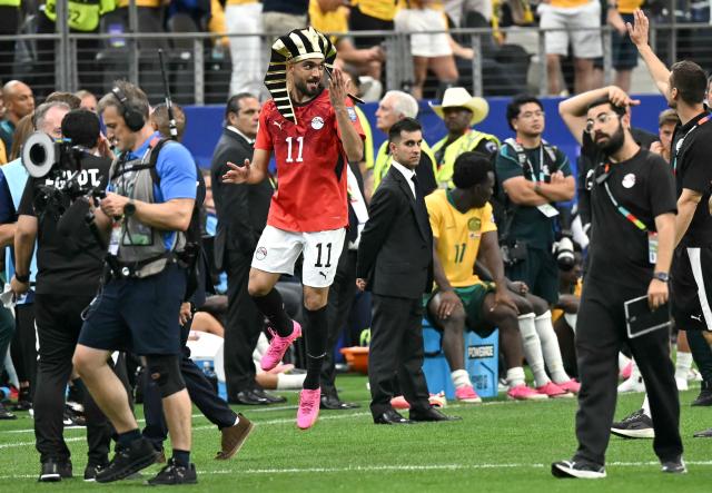 Egypt's midfielder #11 Mostafa Ziko celebrates after winning the 2026 World Cup round of 32 football match between Australia and Egypt at the Dallas Stadium in Arlington on July 3, 2026.  (Photo by Paul ELLIS / AFP)
