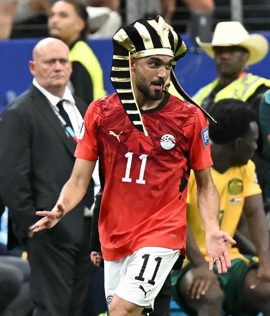 Egypt's midfielder #11 Mostafa Ziko celebrates after winning the 2026 World Cup round of 32 football match between Australia and Egypt at the Dallas Stadium in Arlington on July 3, 2026.  (Photo by Paul ELLIS / AFP)