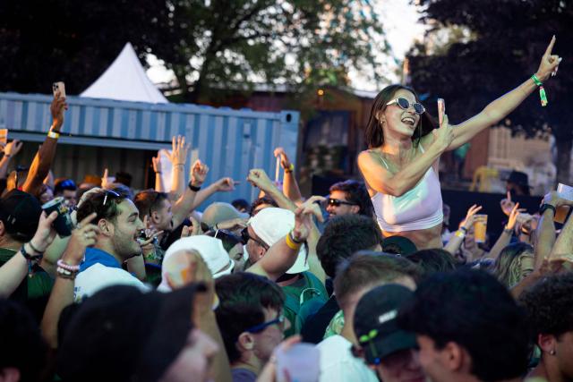 Festivalgoers dance during the 36th edition of the Les Eurockeennes de Belfort music festival, in Sermamagny, eastern France, on July 3, 2026. (Photo by ROMEO BOETZLE / AFP)